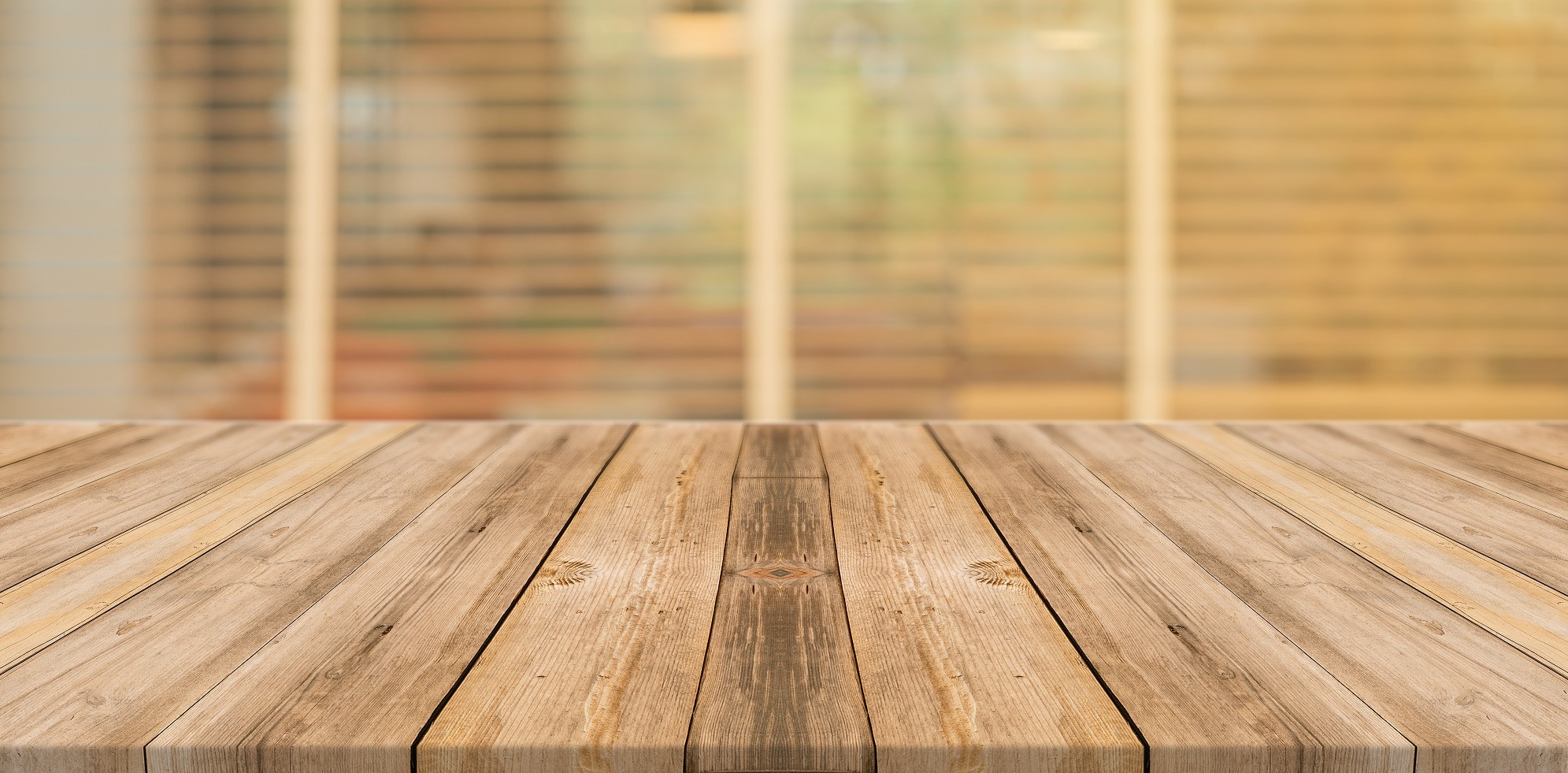 Wooden board empty table top on of blurred background. Perspecti
